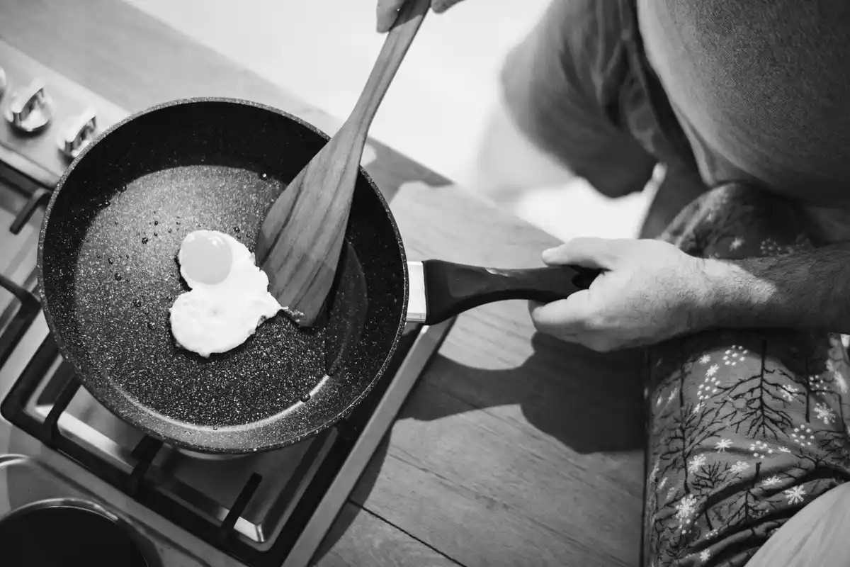 overfilled frying pan cooking kitchen