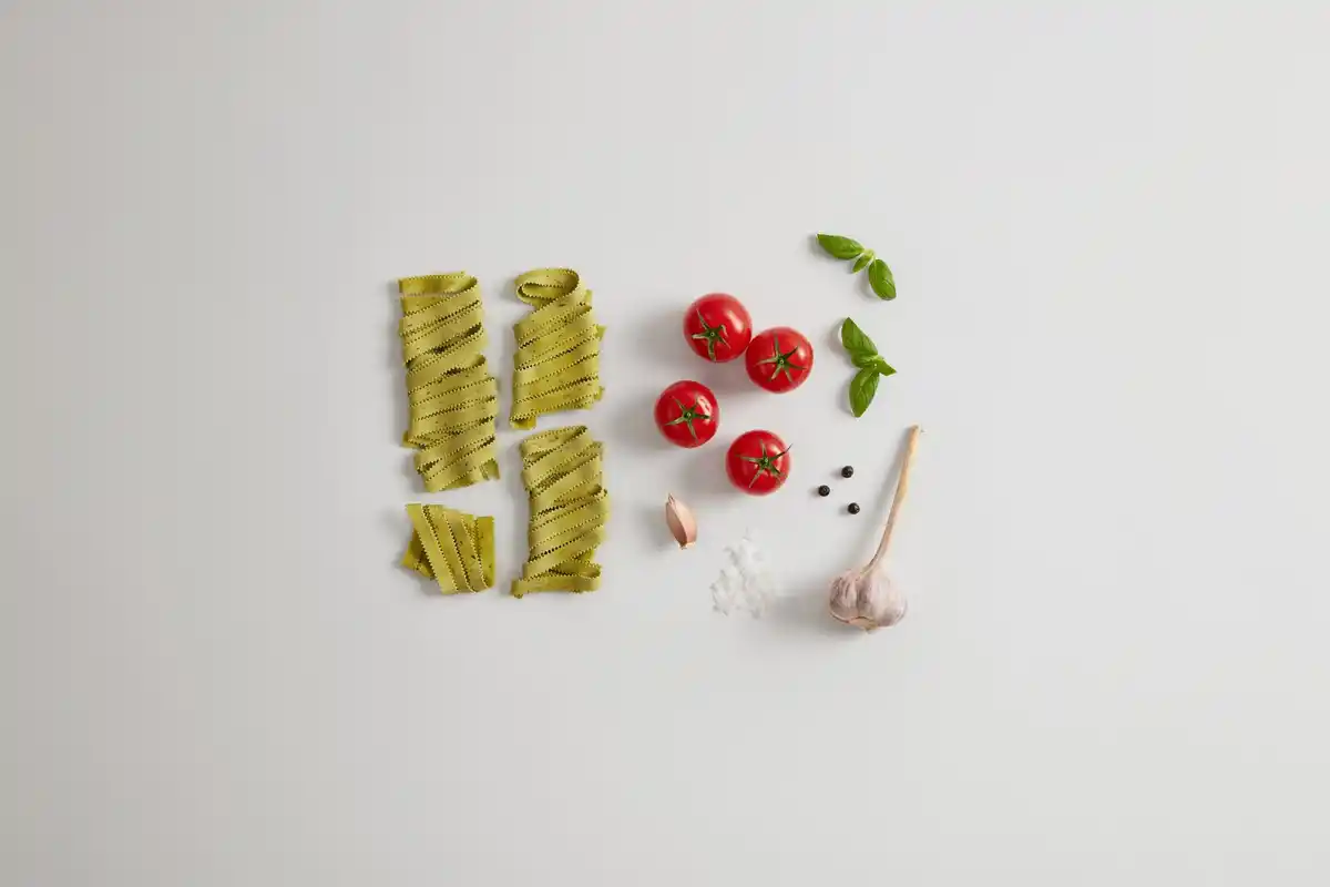fresh herbs and lemon on pasta