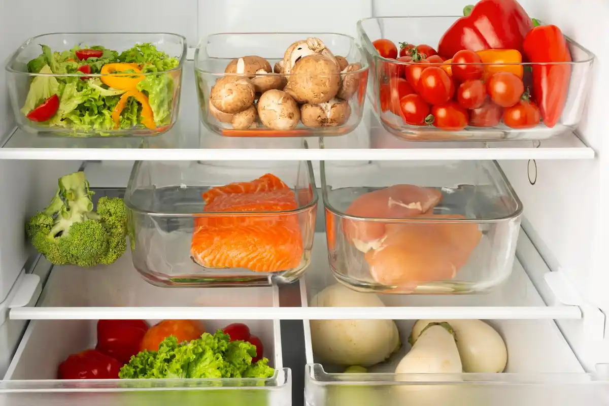 Dutch fridge with labeled containers of leftovers