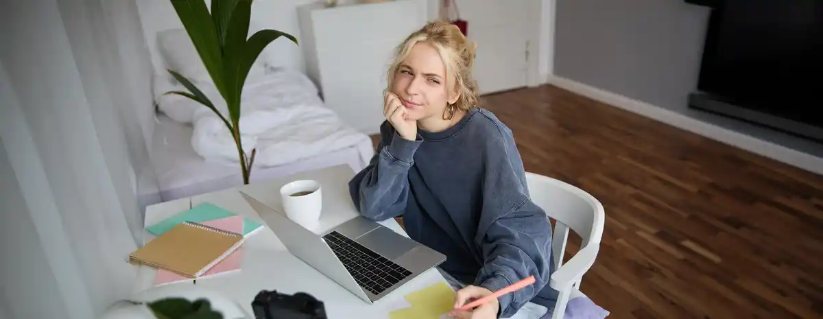 busy working at home desk laptop coffee